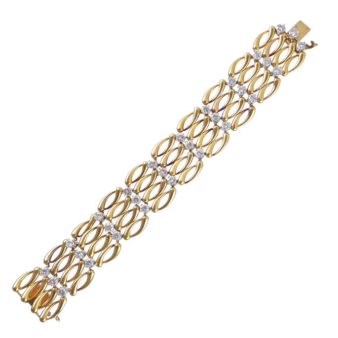 Four row gold and diamond chainlink strap bracelet by Cartier, New York, made in France, with lattice of navette shaped links, | MasterArt